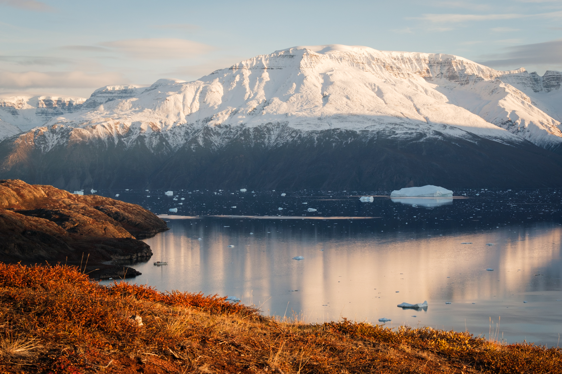 Sailing yacht anchoring in Scoresbysund. 